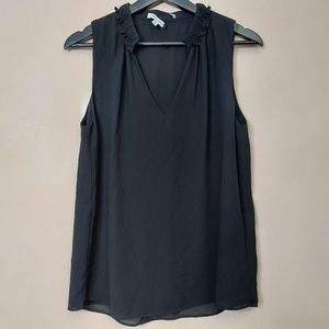 Naked Zebra  v neck sleeveless blouse with ruffle detail at the neckline medium